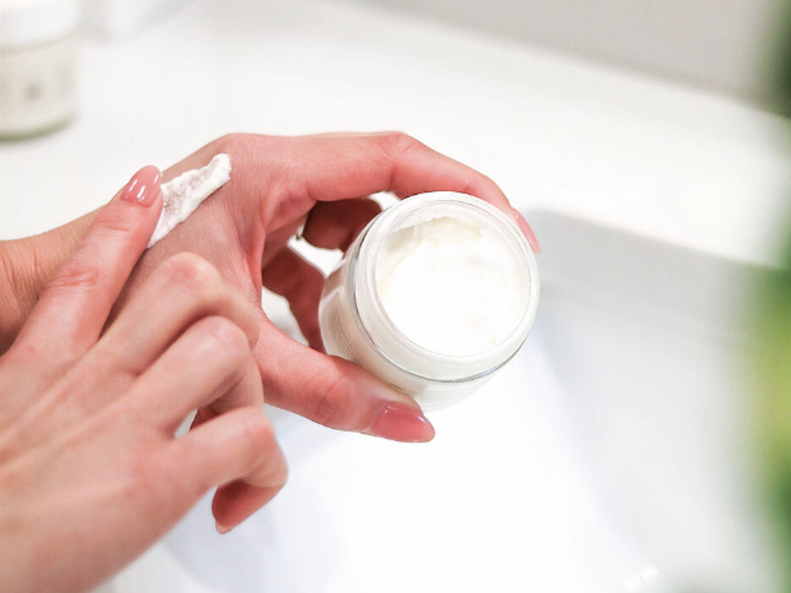 Luxurious tallow cream being applied to visibly dry skin. Showcasing the smooth texture of our artisanal beef tallow balm, this deeply hydrating natural emollient is sourced from premium grass-fed British cows. Free from additives, perfect for skin barrier repair